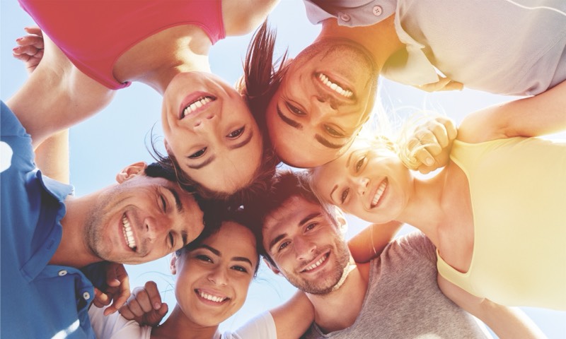 Joyful friends gathered in a circle